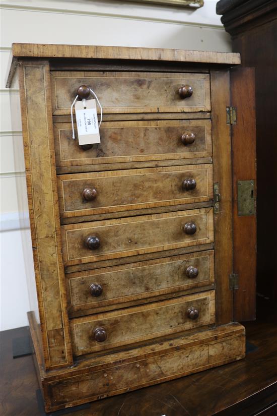 A Victorian cross-banded walnut Wellington chest of small proportions, fitted six drawers, (top a.f.) H.60cm